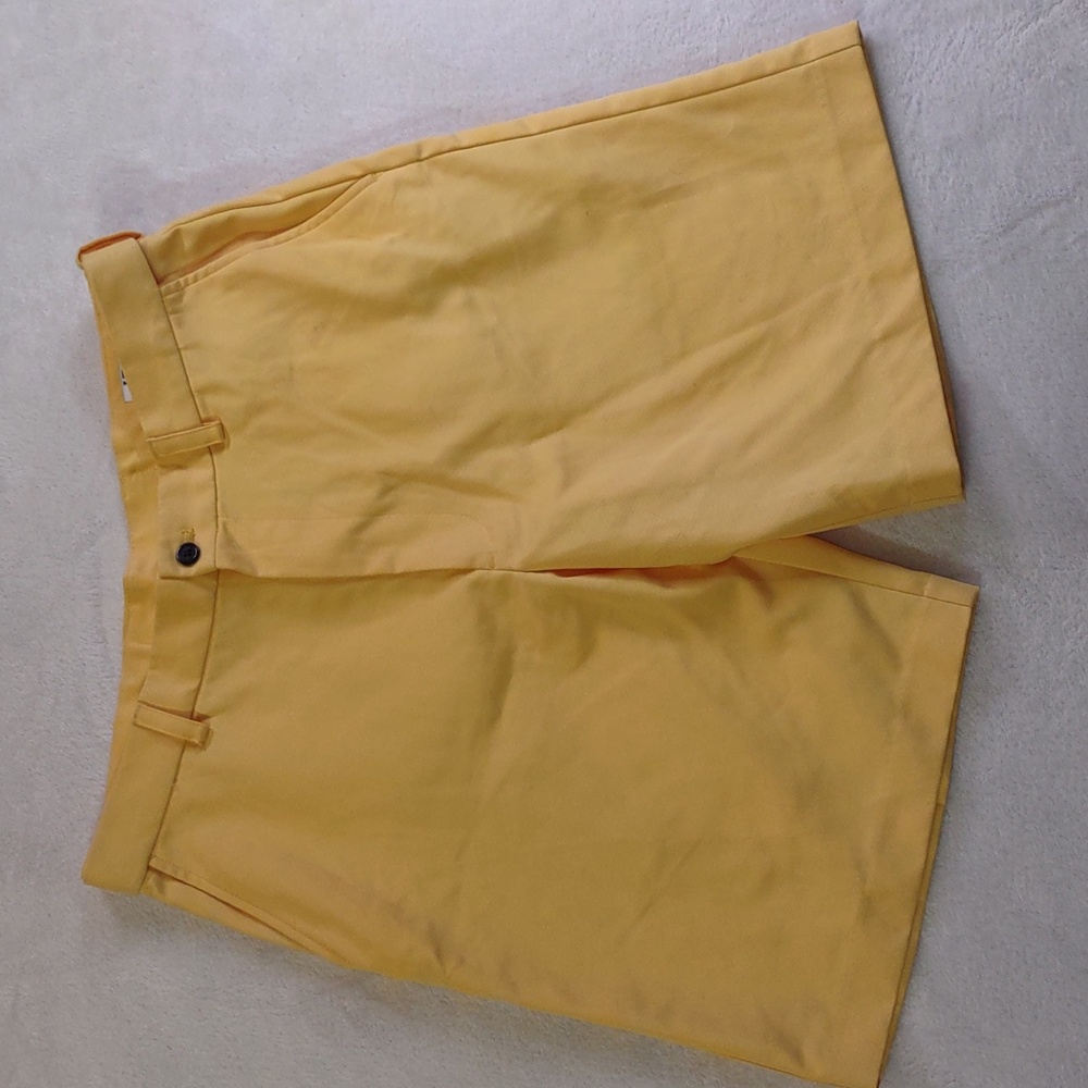 Izod Men's Flat Front Golf Shorts in Sunny Yellow